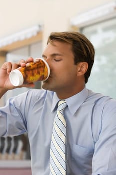 Close-up of a businessman drinking coffee