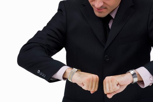 Close-up of a businessman looking at his wristwatch