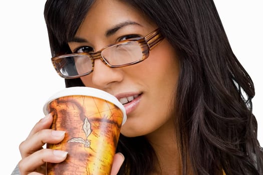 Portrait of a young woman drinking cold drink