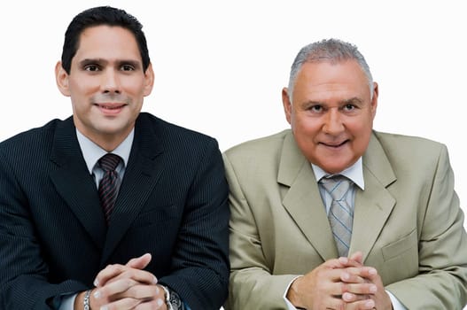 Close-up of two businessmen sitting in a meeting