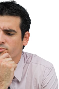 Close-up of a businessman thinking with his hand on his chin
