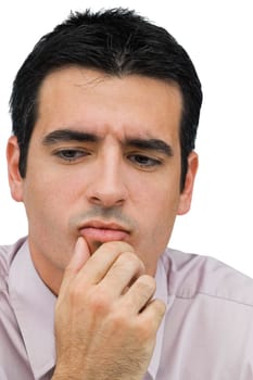 Close-up of a businessman thinking with his hand on his chin