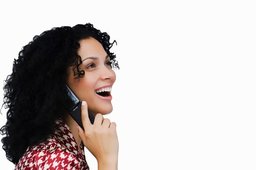 Side profile of a businesswoman using a mobile phone