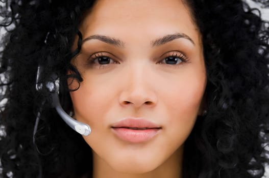 Portrait of a female customer service representative wearing a headset