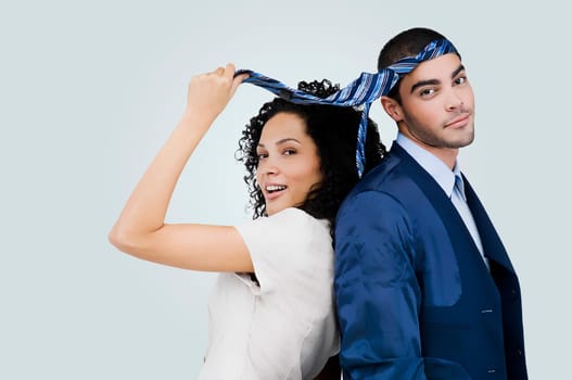 Portrait of a businesswoman and a businessman standing back to back