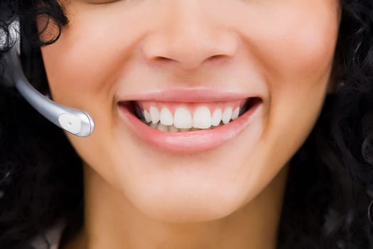 Close-up of a customer service representative smiling