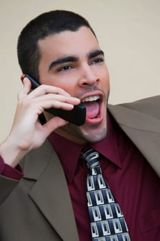Close-up of a businessman talking on a mobile phone