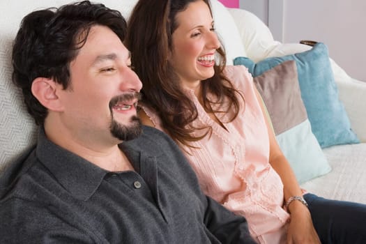 Close-up of a mid adult couple smiling