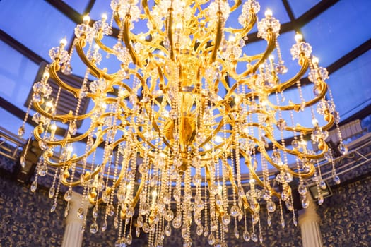 A big beautiful lust on a lot of light bulbs.