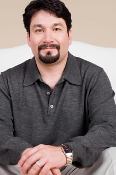 Portrait of a mid adult man smirking