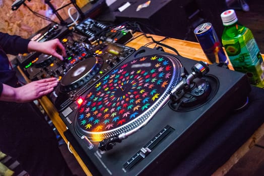 DJ at the remote control. Mixer remote at the concert. Musical equipment.