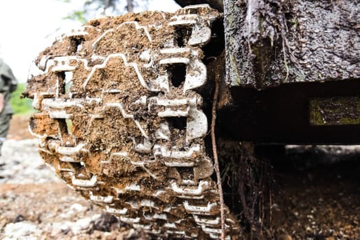 Tracked tractor. Dirt and damp Tracked tractor. Dirt and damp