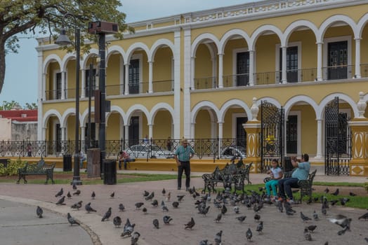 Unidentified people in the Independence Park (plaza) in Campeche, Mexico