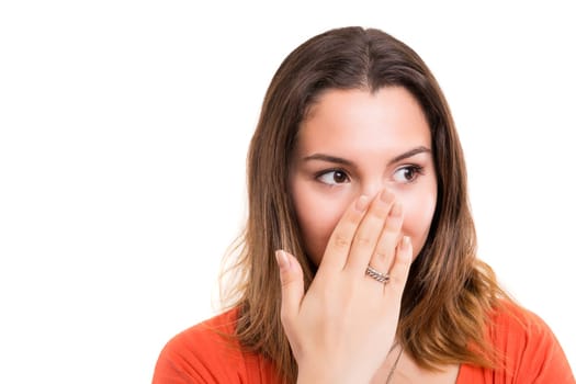 Surprised young woman isolated over white background