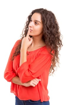 Studio shot: Young woman having a great idea