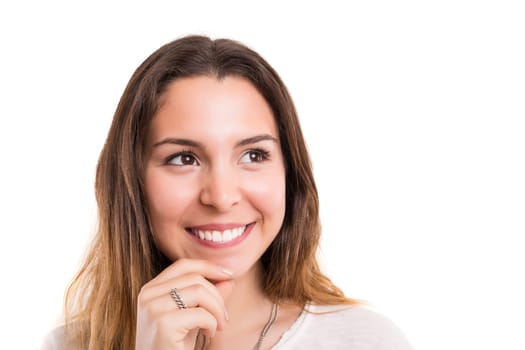 Studio shot: Young woman having a great idea