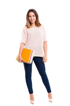 Young student posing over a white background