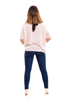 Woman posing with her back faced to camera, isolated over copy space background