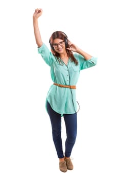 A Happy young woman listening to music