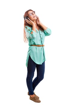 A Happy young woman listening to music