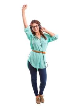 A Happy young woman listening to music