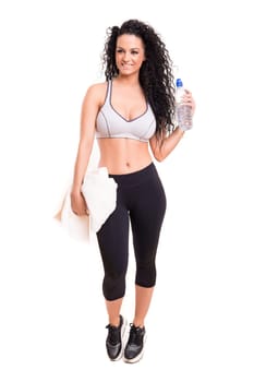 A beautiful young woman exercising - fitness concept