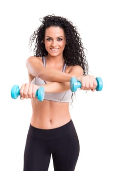 A beautiful young woman exercising - fitness concept