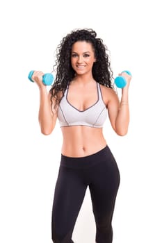 A beautiful young woman exercising - fitness concept