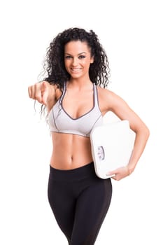 A beautiful young woman exercising - fitness concept