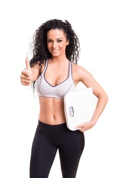 A beautiful young woman exercising - fitness concept