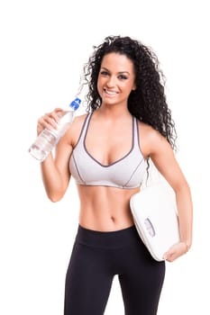 A beautiful young woman exercising - fitness concept