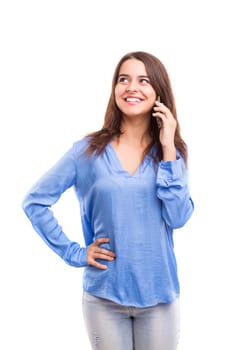 Young beautiful woman at the phone, isolated over a white background