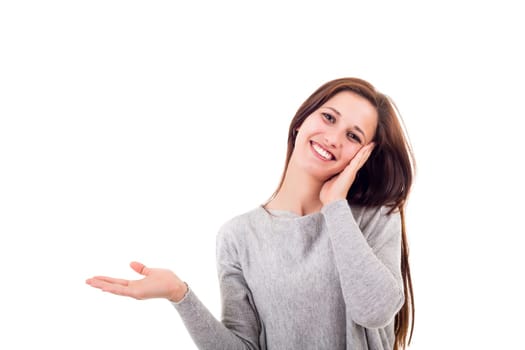 Young beautiful woman presenting your product, isolated over white background