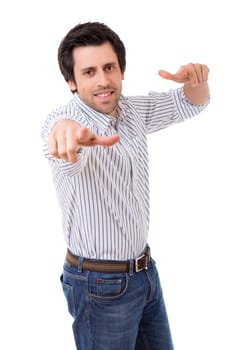 Handsome young man pointing at you, isolated over white background