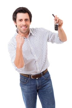 Young adult holding the keys of a new car