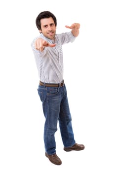 Handsome young man pointing at you, isolated over white background