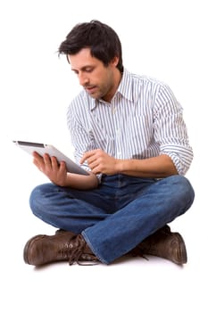 Handsome young man working with a tablet computer