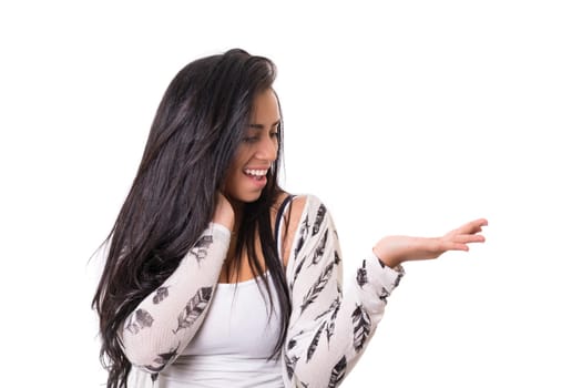 Young beautiful woman presenting your product, isolated over white background