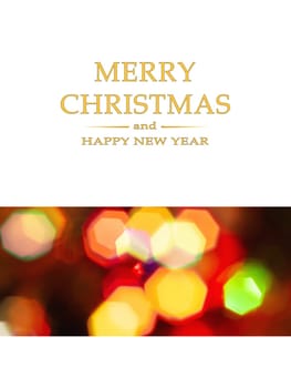 Merry Christmas and Happy New Year greeting card, blurred background of the twinkling lights of the Christmas tree. Greeting card background.