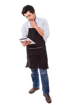 Young man searching for a new recipe over the internet