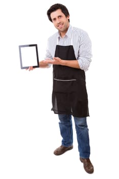 Young cooker presenting a new recipe or a cuisine app on a tablet computer