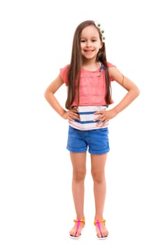 Beautiful young girl posing isolated over white
