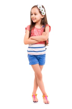 Beautiful young girl posing isolated over white