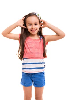 Beautiful young girl posing isolated over white