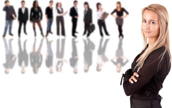 Beautiful business woman posing with group of people in the back