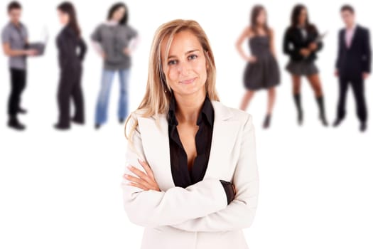 Beautiful business woman posing with group of people in the back