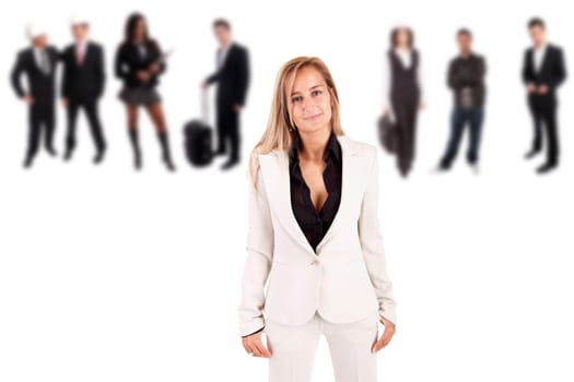 business woman posing with group of people in the back