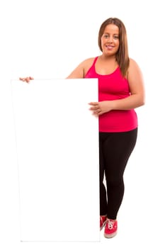 A beautiful large woman holding a white board