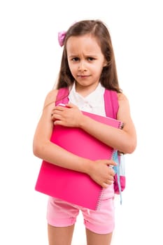 A small student posing isolated over white background