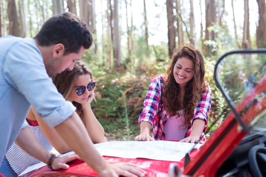 Group of friends on a roadtrip through countryside